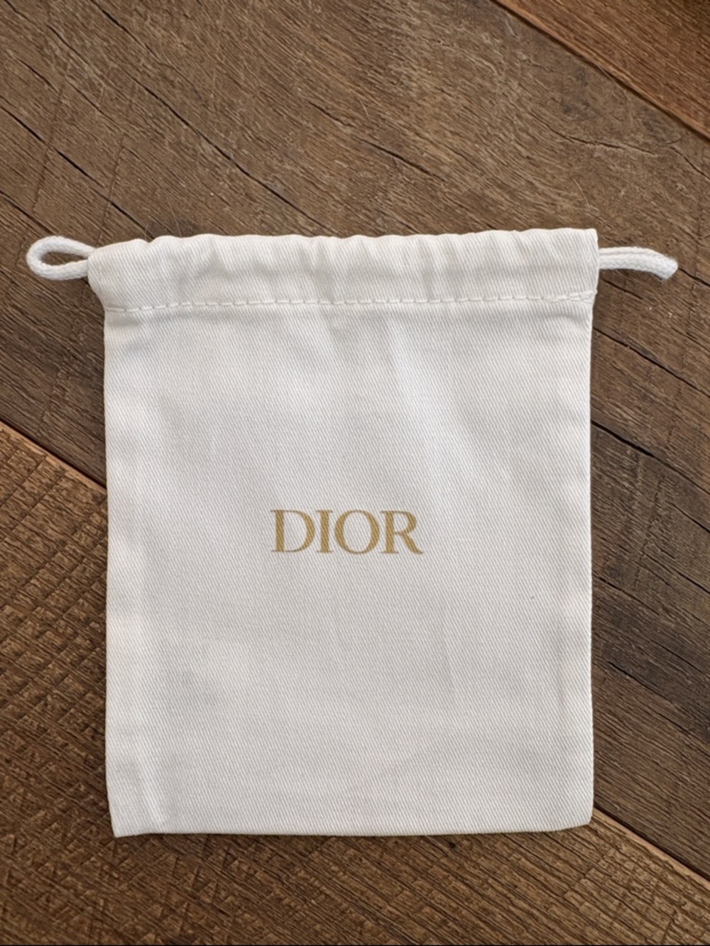 Dior Cream Drawstring Pouch with Gold Logo
